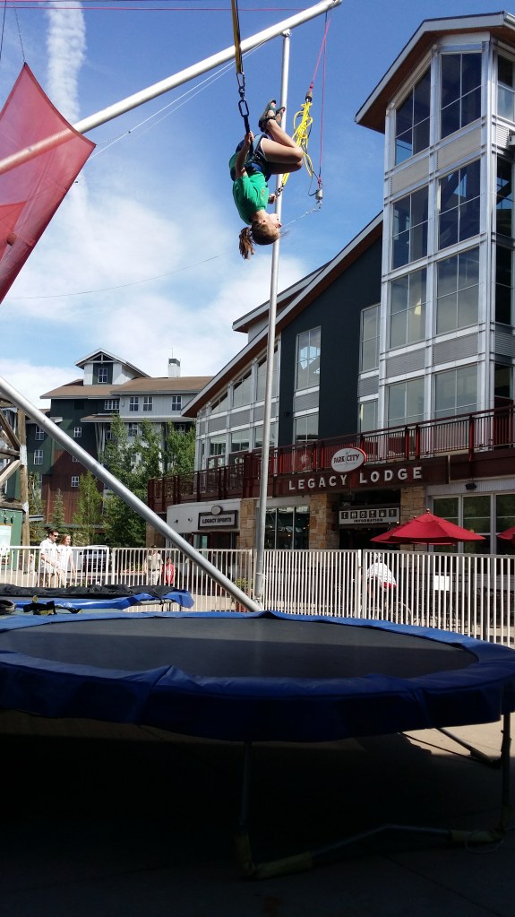 Anna high on the trampoline bungee!