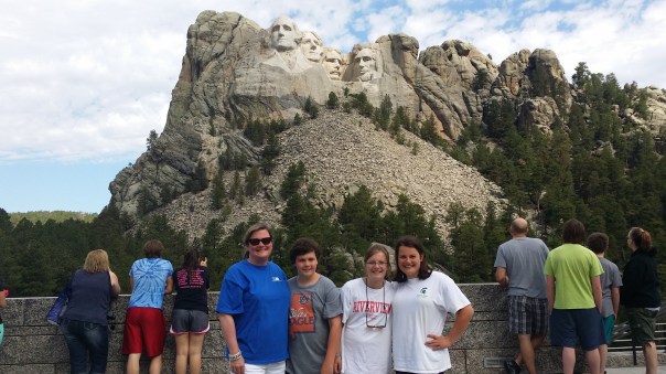 My four sculptures in front of some mountain.  
